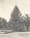 A 1913 black and white photograph of the first decorated community Christmas tree in White Park.